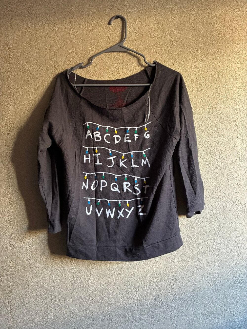 Stranger Things Alphabet Christmas Lights Long Sleeve Top – Size S
